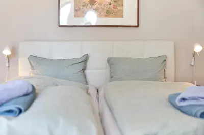 Ein Bett oder Betten in einem Zimmer der Unterkunft Altstadt Residenz Wohnung 2