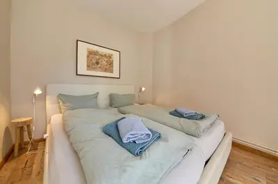 Ein Bett oder Betten in einem Zimmer der Unterkunft Altstadt Residenz Wohnung 2