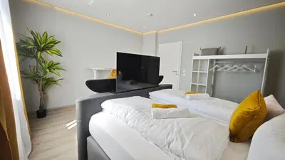 Ein Bett oder Betten in einem Zimmer der Unterkunft DANESSI-Familie,Business,nahe Koblenz,6 Personen,Saniert,direkte Anbindung Industriegebiet,TV Kingsize Boxspringbett