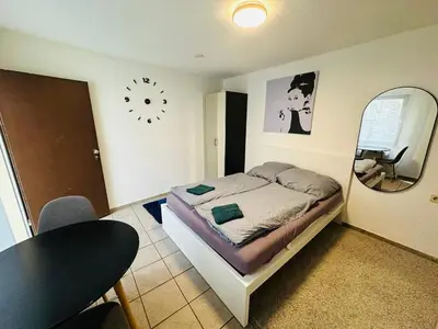 Ein Bett oder Betten in einem Zimmer der Unterkunft Privat Studio mit Doppelbett