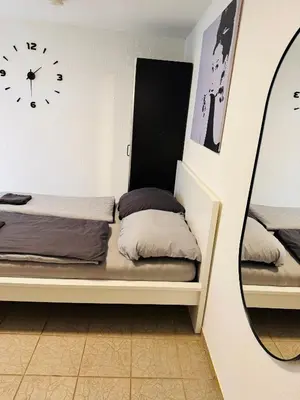 Ein Bett oder Betten in einem Zimmer der Unterkunft Privat Studio mit Doppelbett