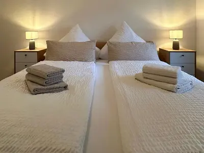 Ein Bett oder Betten in einem Zimmer der Unterkunft Ferienhaus am Golfplatz