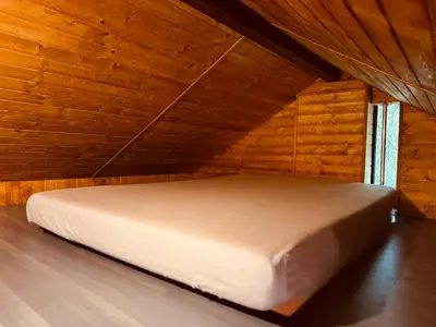 Ein Bett oder Betten in einem Zimmer der Unterkunft Haus am See