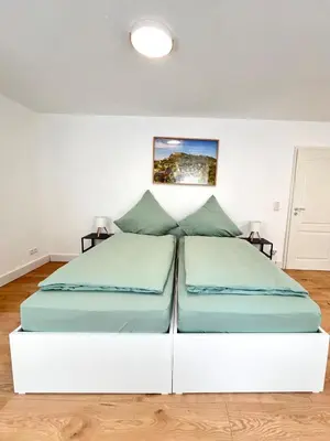 Ein Bett oder Betten in einem Zimmer der Unterkunft Apartment Brunnenstraße in Braubach