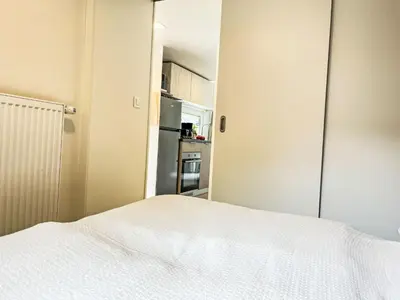 Ein Bett oder Betten in einem Zimmer der Unterkunft Holiday Home Tiny Haus Vierseenblick Nummer 4 by Interhome