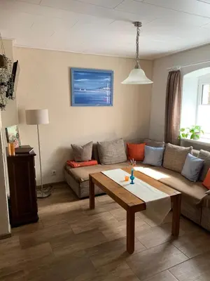 Ein Sitzbereich in der Unterkunft Ferienhaus Brigitte