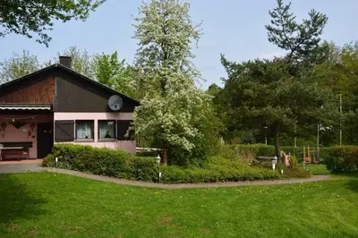 Ein Garten an der Unterkunft Haus Waldfrieden OG