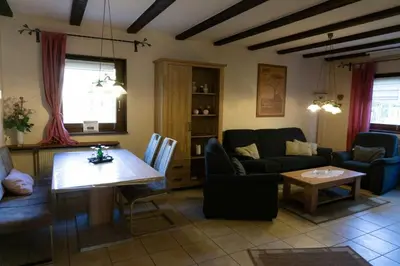 Ein Sitzbereich in der Unterkunft Haus Waldfrieden OG