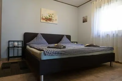 Ein Bett oder Betten in einem Zimmer der Unterkunft Haus Ferienglück