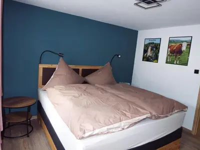 Ein Bett oder Betten in einem Zimmer der Unterkunft Feriendomizil-Vulkaneifel