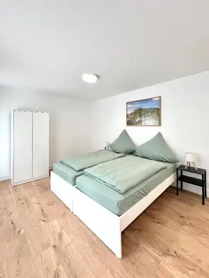 Ein Bett oder Betten in einem Zimmer der Unterkunft Privatzimmer in Apartment Brunnenstraße Braubach