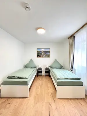 Ein Bett oder Betten in einem Zimmer der Unterkunft Privatzimmer in Apartment Brunnenstraße Braubach