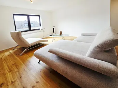 Ein Sitzbereich in der Unterkunft BAT Home Solutions Trierweiler - alles was ein Hotel nicht bietet - 80 qm, 3 Zimmer, 5 Personen, Terrasse, BBQ und Kino