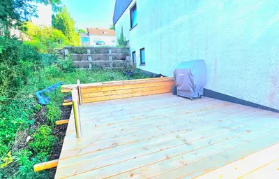 Ein Garten an der Unterkunft BAT Home Solutions Trierweiler - alles was ein Hotel nicht bietet - 80 qm, 3 Zimmer, 5 Personen, Terrasse, BBQ und Kino