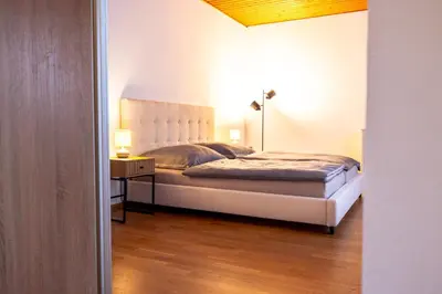Ein Bett oder Betten in einem Zimmer der Unterkunft Rhein-Haus