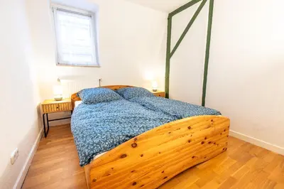 Ein Bett oder Betten in einem Zimmer der Unterkunft Rhein-Haus