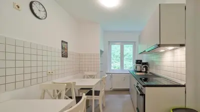Küche/Küchenzeile in der Unterkunft Monteurwohnungen in Trier - Parkplatz - Einzelbetten - Waschmaschine und Trockner