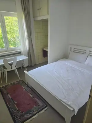 Ein Bett oder Betten in einem Zimmer der Unterkunft WX Home - Willkommen in Ihrer Ferienwohnung in Idar-Oberstein