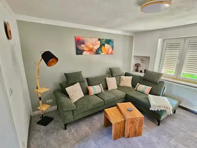 Ein Sitzbereich in der Unterkunft Ferienwohnung Waldblick