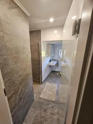 Ein Bett oder Betten in einem Zimmer der Unterkunft Ferienwohnung Waldblick