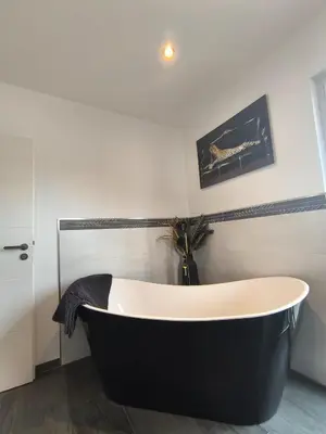 Ein Badezimmer in der Unterkunft VILLA VULKANEIFEL -modern -familienfreundlich -Terrasse -Doppelgarage -ruhiger Lage