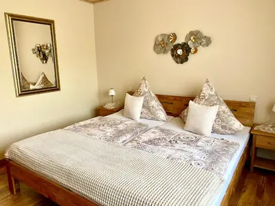 Ein Bett oder Betten in einem Zimmer der Unterkunft Gästezimmer Engels