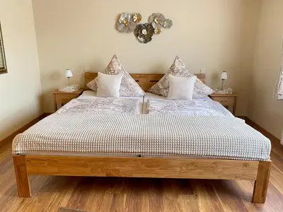 Ein Bett oder Betten in einem Zimmer der Unterkunft Gästezimmer Engels