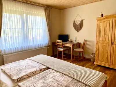 Ein Bett oder Betten in einem Zimmer der Unterkunft Gästezimmer Engels