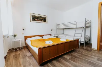 Ein Bett oder Betten in einem Zimmer der Unterkunft Gemütliches Gästehaus am Rhein!