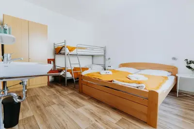 Ein Bett oder Betten in einem Zimmer der Unterkunft Gemütliches Gästehaus am Rhein!