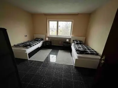 Ein Bett oder Betten in einem Zimmer der Unterkunft Wohlfühlen mit viel Raum und Garten am RHEIN