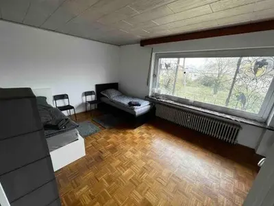Ein Sitzbereich in der Unterkunft Wohlfühlen mit viel Raum und Garten am RHEIN