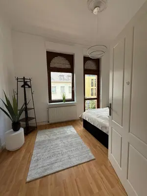 Ein Bett oder Betten in einem Zimmer der Unterkunft Schönes Apartment in der nähe vom Hauptbahnhof