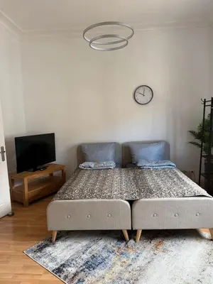 Ein Bett oder Betten in einem Zimmer der Unterkunft Schönes Apartment in der nähe vom Hauptbahnhof