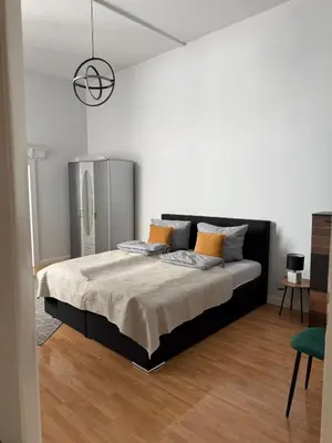 Ein Bett oder Betten in einem Zimmer der Unterkunft Schönes Apartment in der nähe vom Hauptbahnhof