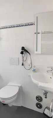 Ein Badezimmer in der Unterkunft Hotel Zur Fähre