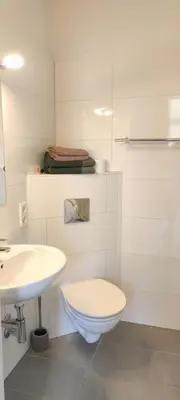 Ein Badezimmer in der Unterkunft Hotel Zur Fähre