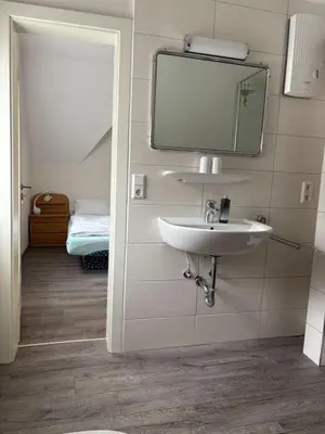 Ein Badezimmer in der Unterkunft Das blaue Haus