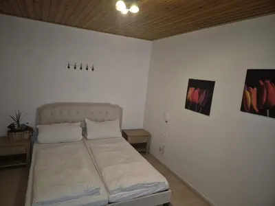 Ein Bett oder Betten in einem Zimmer der Unterkunft Haus Sofia