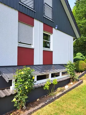 Ein Garten an der Unterkunft Pension Müller