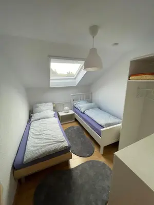 Ein Bett oder Betten in einem Zimmer der Unterkunft Ferienwohnung I&I