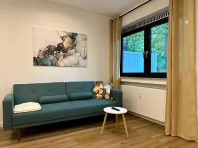 Ein Sitzbereich in der Unterkunft Ferienwohnung an der Roseninsel