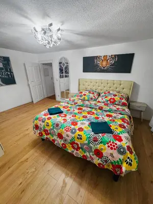 Ein Bett oder Betten in einem Zimmer der Unterkunft RheinOase mit Garten für Familien & Gruppen
