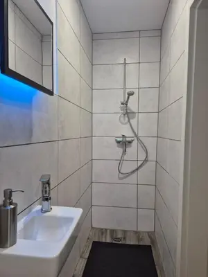 Ein Badezimmer in der Unterkunft Ferienwohnung in Ürzig mit Moselblick