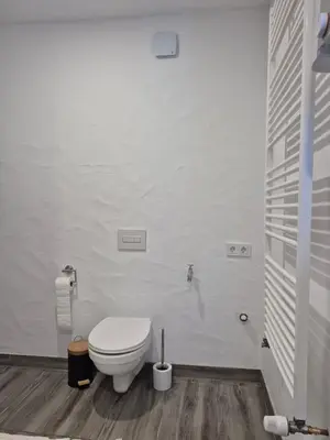 Ein Badezimmer in der Unterkunft Ferienwohnung in Ürzig mit Moselblick