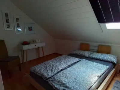Ein Bett oder Betten in einem Zimmer der Unterkunft Haus Breser
