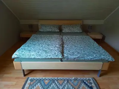 Ein Bett oder Betten in einem Zimmer der Unterkunft Haus Breser