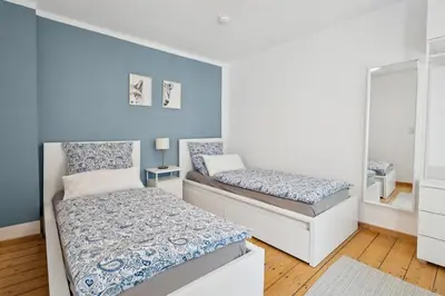Ein Bett oder Betten in einem Zimmer der Unterkunft Ferienhaus für Mensch & Hund mit großer Terrasse