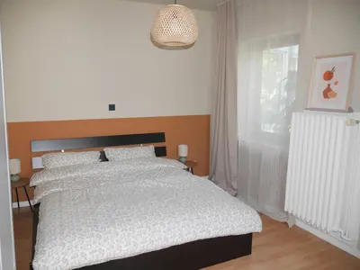Ein Bett oder Betten in einem Zimmer der Unterkunft Gartenblick Kottenheim - Gemütliche 95qm mit eigenem Garten