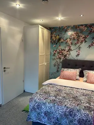 Ein Bett oder Betten in einem Zimmer der Unterkunft Luxus Studio 10 Min zur Porta Nigra inkl Parkplatz